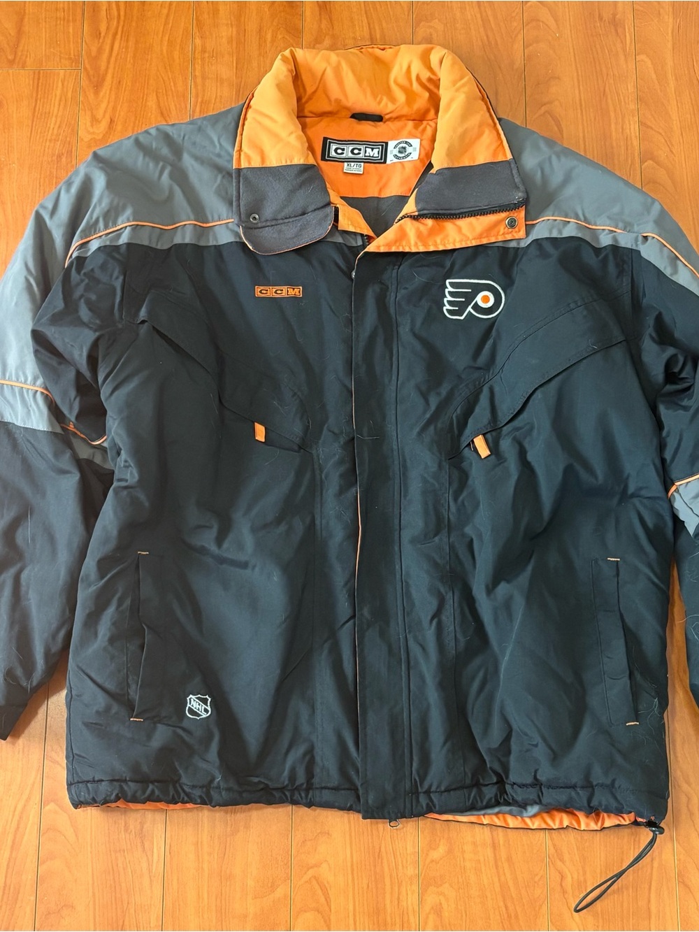 Vintage 90’s CCM Philadelphia Flyers Black & Orange Puffer Jacket - Men’s XL